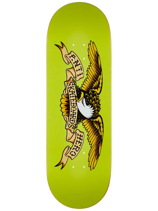 Skateboard deck with an eagle design and text on a green background