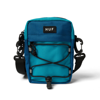 • Shell: 100% nylon x-pac fabric
• Lining: 210D nylon with PU coating
• Spacious main compartment with dualzippers
• Front zip-pocket
• Rubber injection molded patch at front
• Sock cord net
• Adjustable strap with clip attachment
• Approximately 6.75” H X 4.75” W X 2.0” D