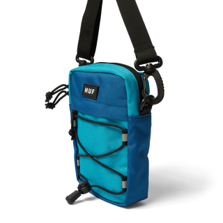 • Shell: 100% nylon x-pac fabric
• Lining: 210D nylon with PU coating
• Spacious main compartment with dualzippers
• Front zip-pocket
• Rubber injection molded patch at front
• Sock cord net
• Adjustable strap with clip attachment
• Approximately 6.75” H X 4.75” W X 2.0” D