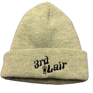 Grey knit beanie with '3rd Lair' embroidery on a gray background
