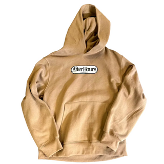Beige hoodie with 'After Hours' logo on a blue textured surface