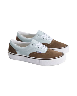 Pair of brown and light blue sneakers on a white background