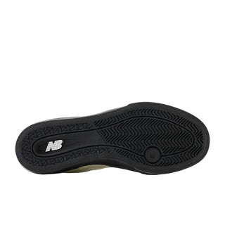 Black sole of a shoe with New Balance logo on a white background