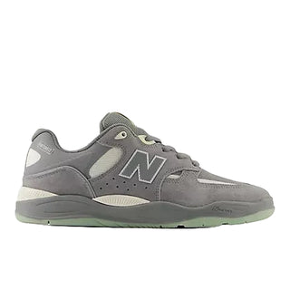 Gray sneaker with New Balance logo on a white background